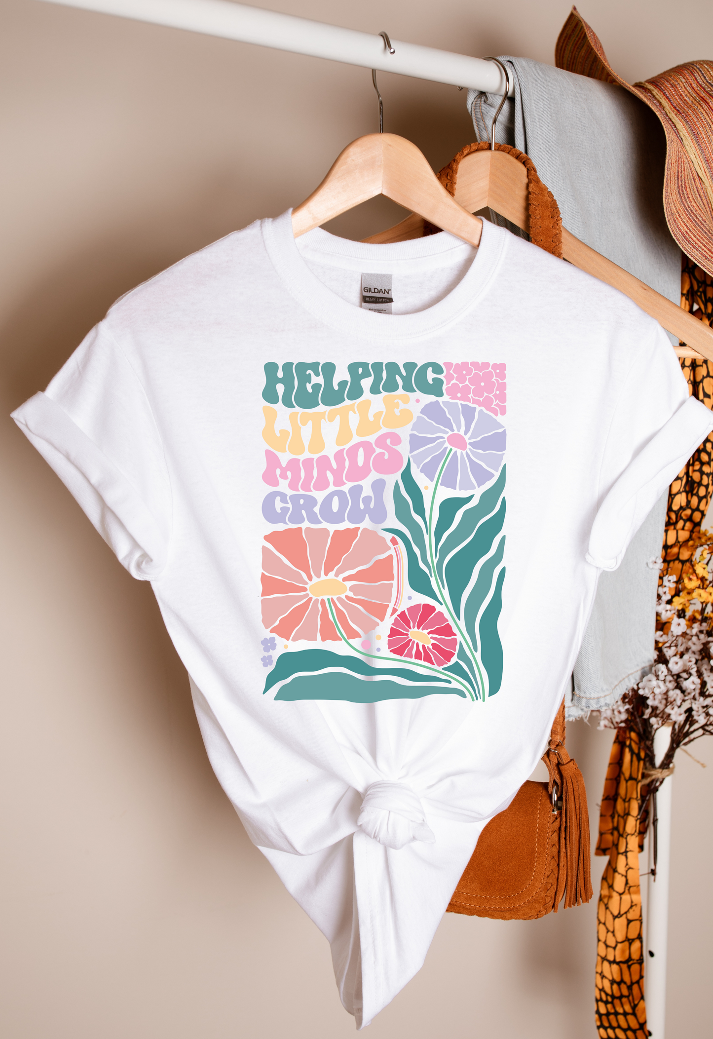 Helping Little Minds Grow Groovy Floral T-shirt