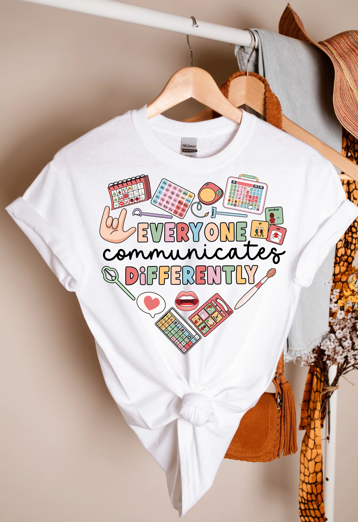 Everyone Communicates Differently Teacher T-shirt